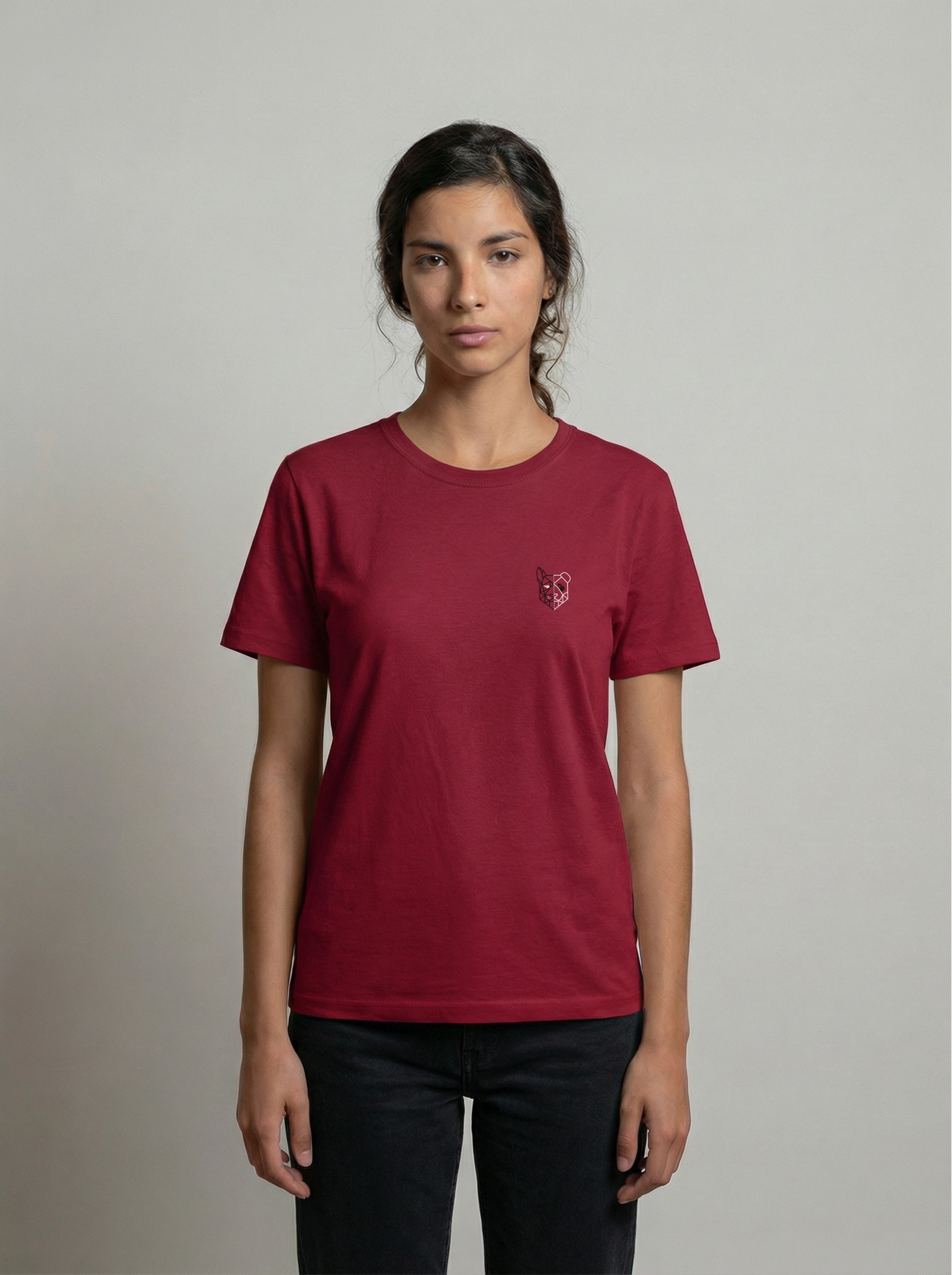 Person wearing a maroon t-shirt with a small padoganda logo on a plain background